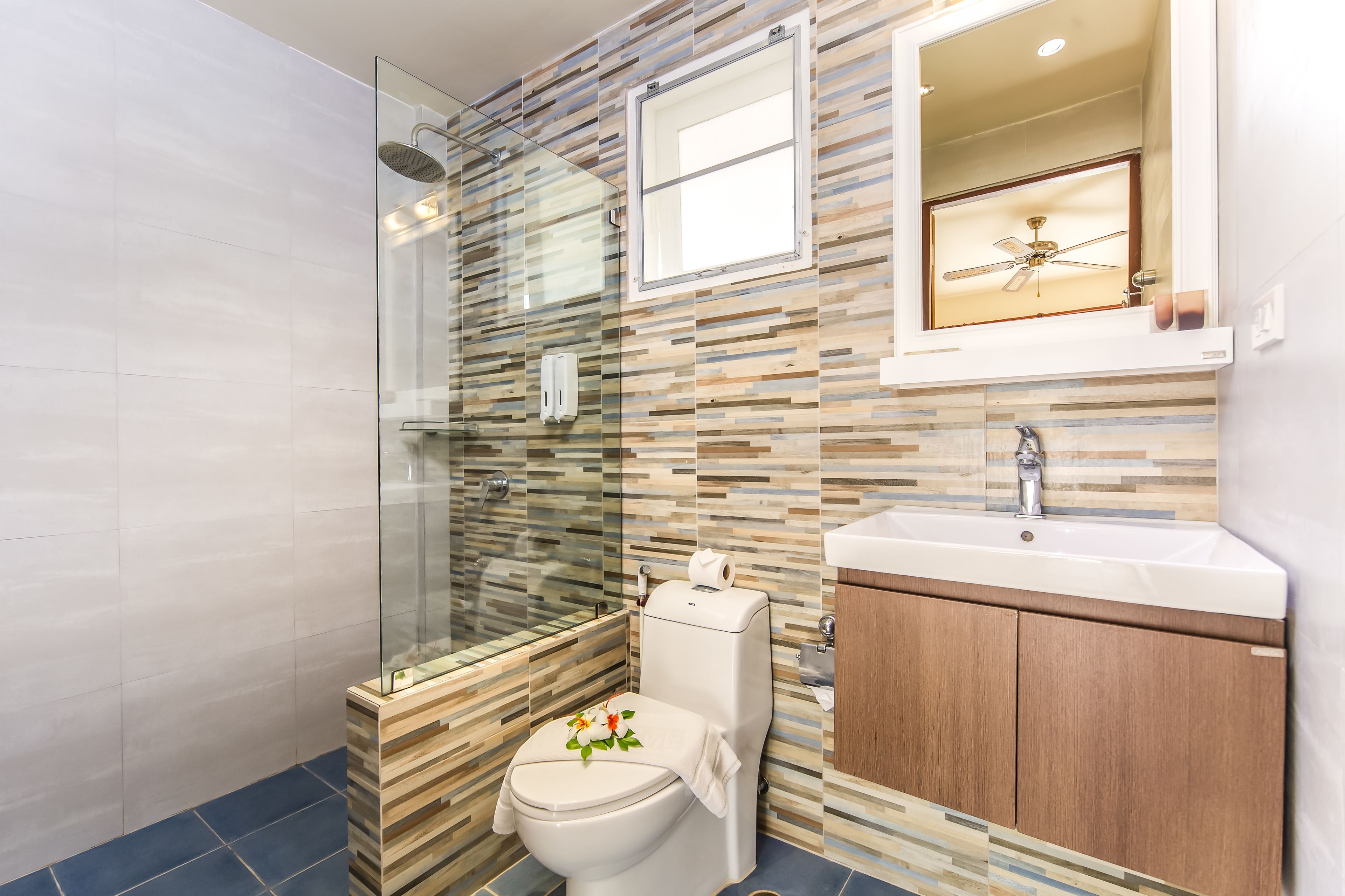 3 bedrooms deluxe villa- | bathroom | rainfall showerhead, designer toiletries, hair dryer, dressing gowns