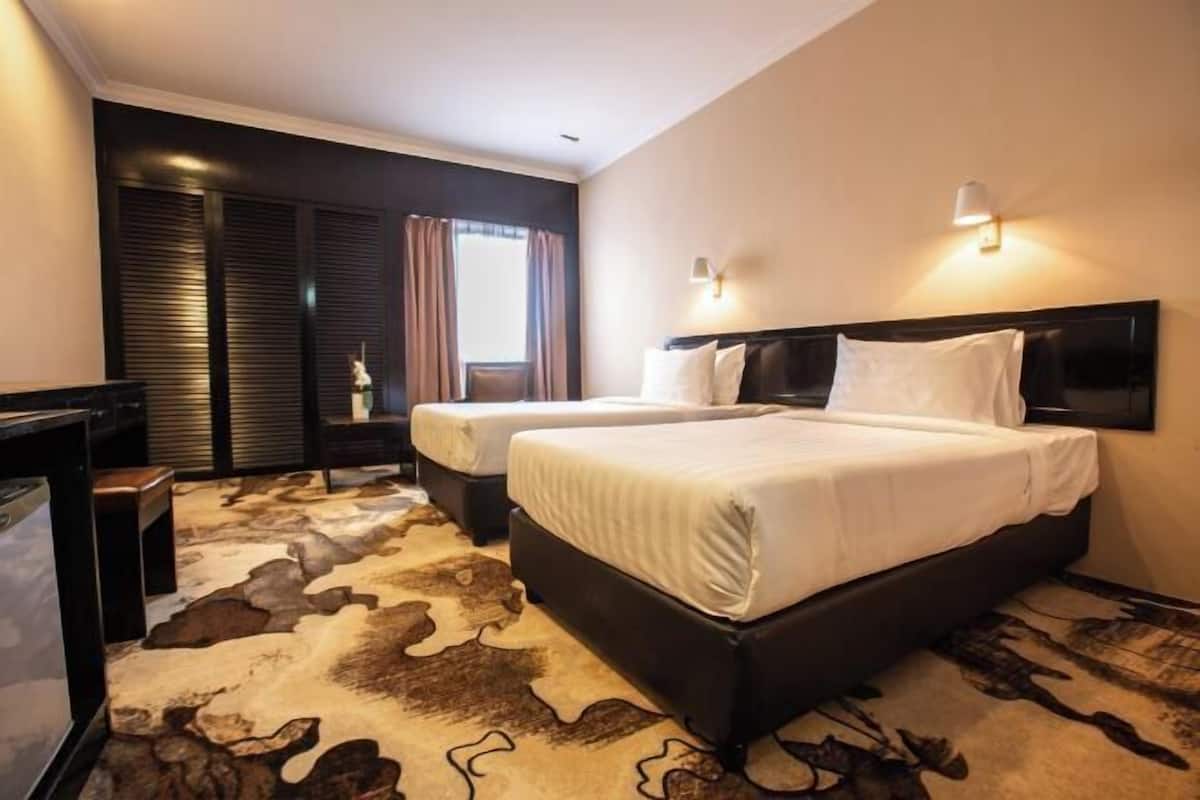 In-room safe, iron/ironing board (on request), WiFi (free), alarm clocks