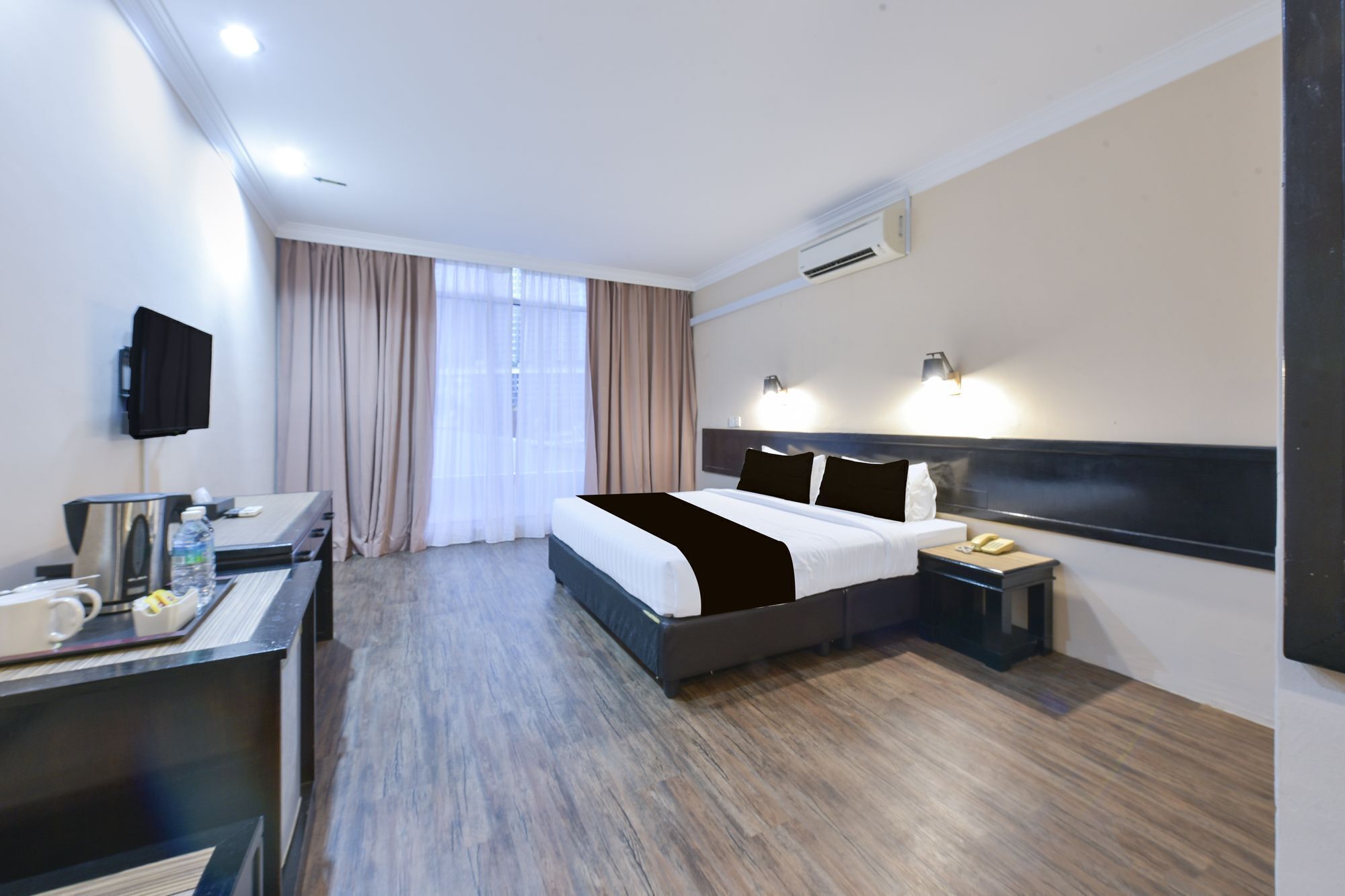 غرفة ديلوكس ثلاثية | خزنة داخل الغرفة ومكواة/لوح كي وواي فاي مجانًا ومُنبهات