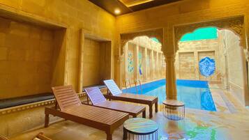 Outdoor pool, open 9:00 AM to 8:00 PM, pool loungers