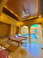 Outdoor pool, open 9:00 AM to 8:00 PM, sun loungers