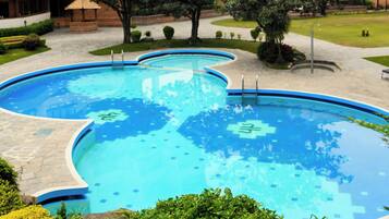 Outdoor pool, pool umbrellas, sun loungers