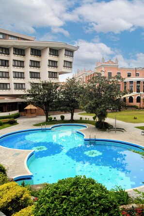 Outdoor pool, pool umbrellas, pool loungers