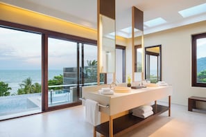 Suite, 1 King Bed, Ocean View (Vana Belle Suite) | Bathroom | Separate tub and shower, rainfall showerhead, eco-friendly toiletries