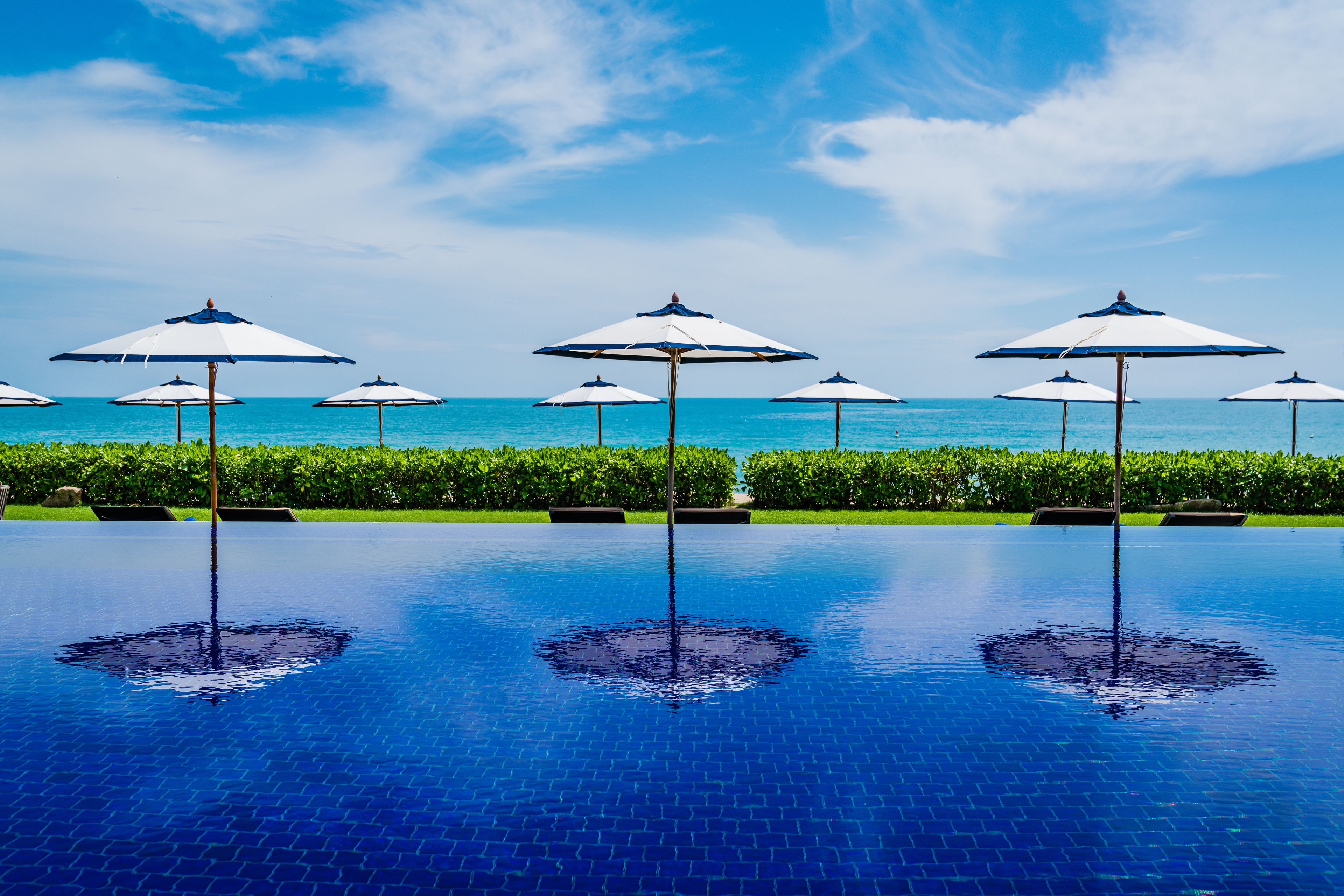 outdoor pool, open 7:00 am to 7:00 pm, free pool cabanas, pool umbrellas