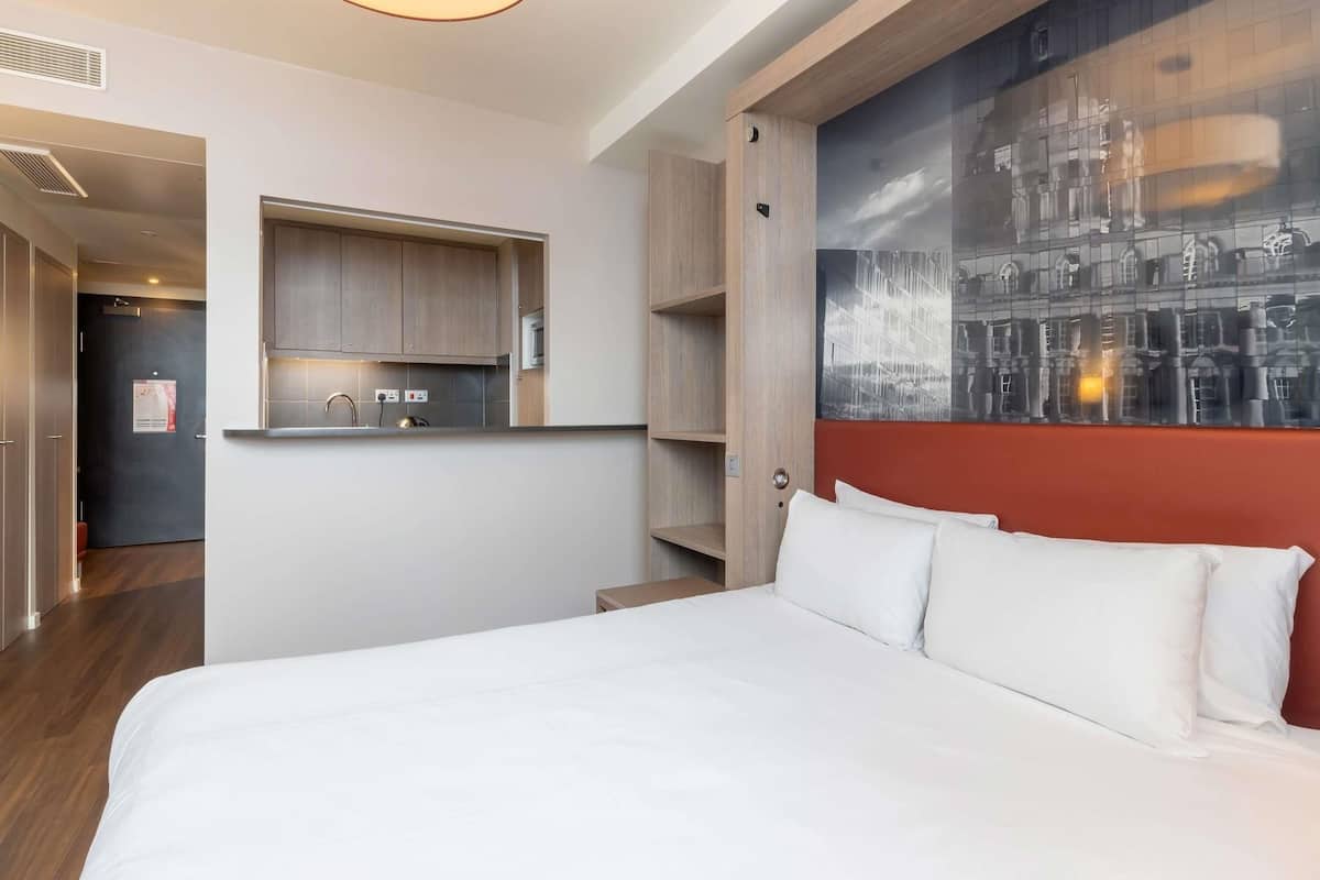In-room safe, desk, laptop workspace, blackout curtains