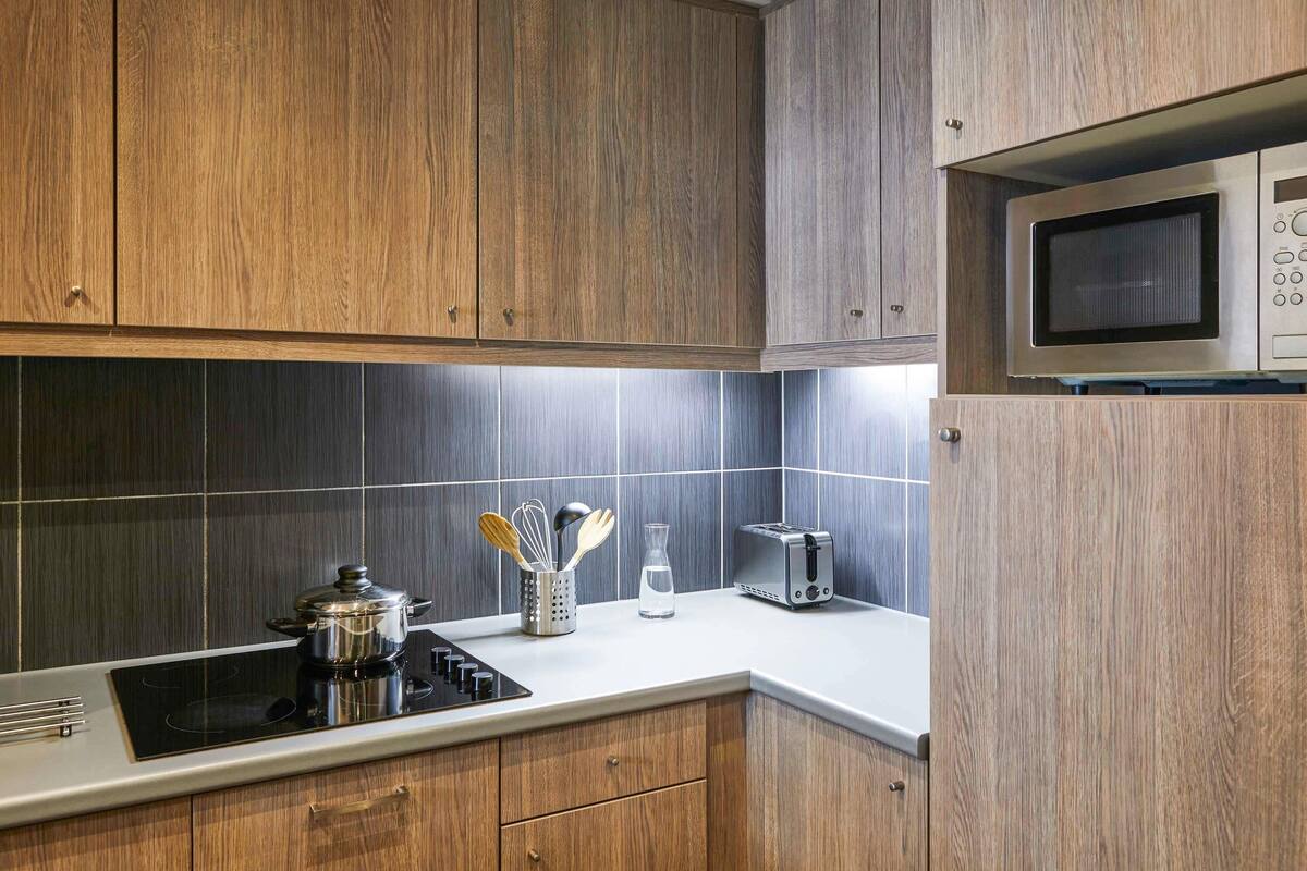In-room safe, desk, laptop workspace, blackout curtains