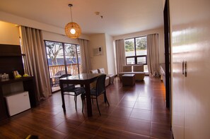 Suite | Living area | 32-inch LCD TV with cable channels, TV - Apple Tree Resort and Hotel (Opol)