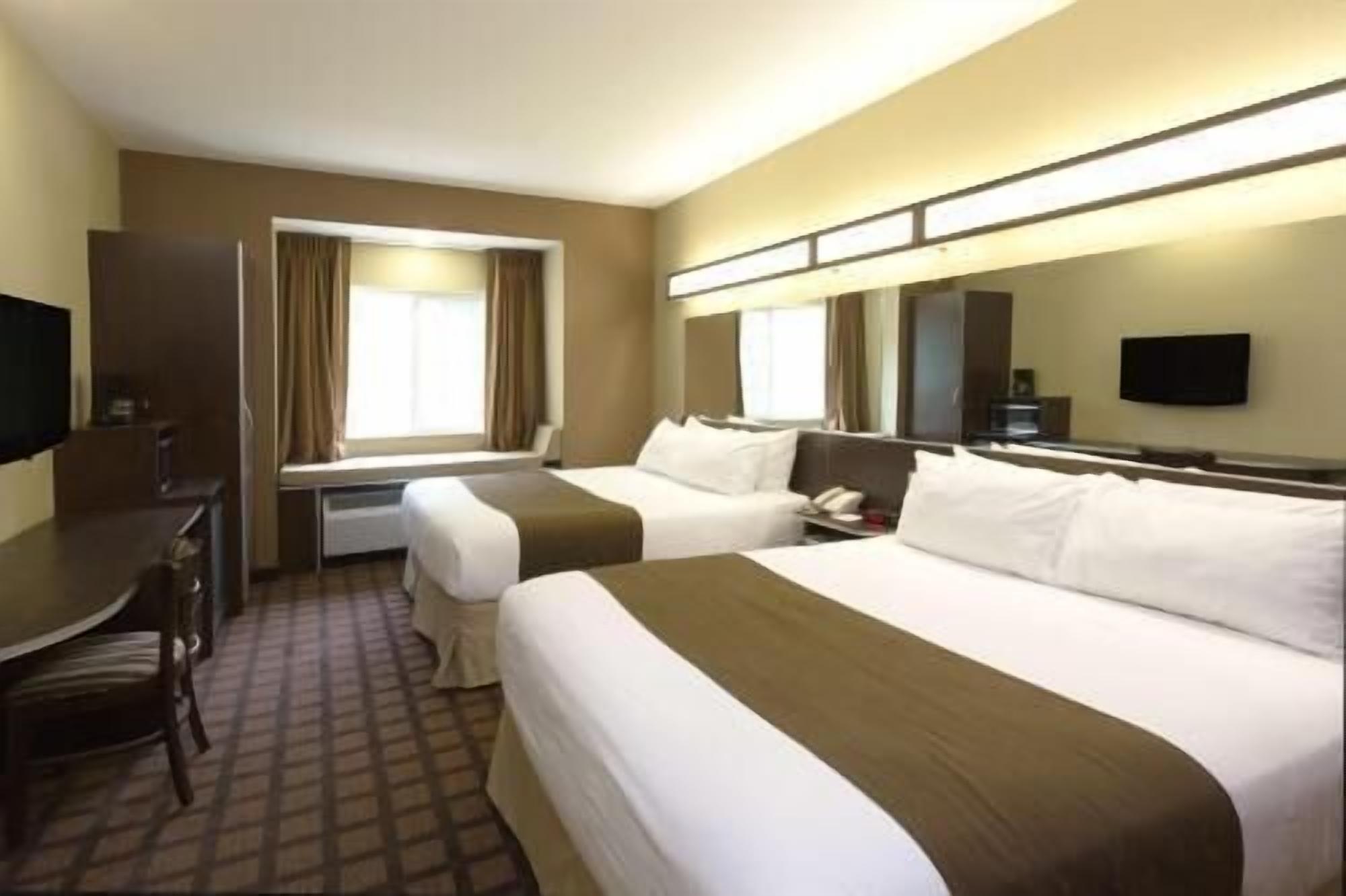 In-room safe, desk, iron/ironing board, free cribs/infant beds