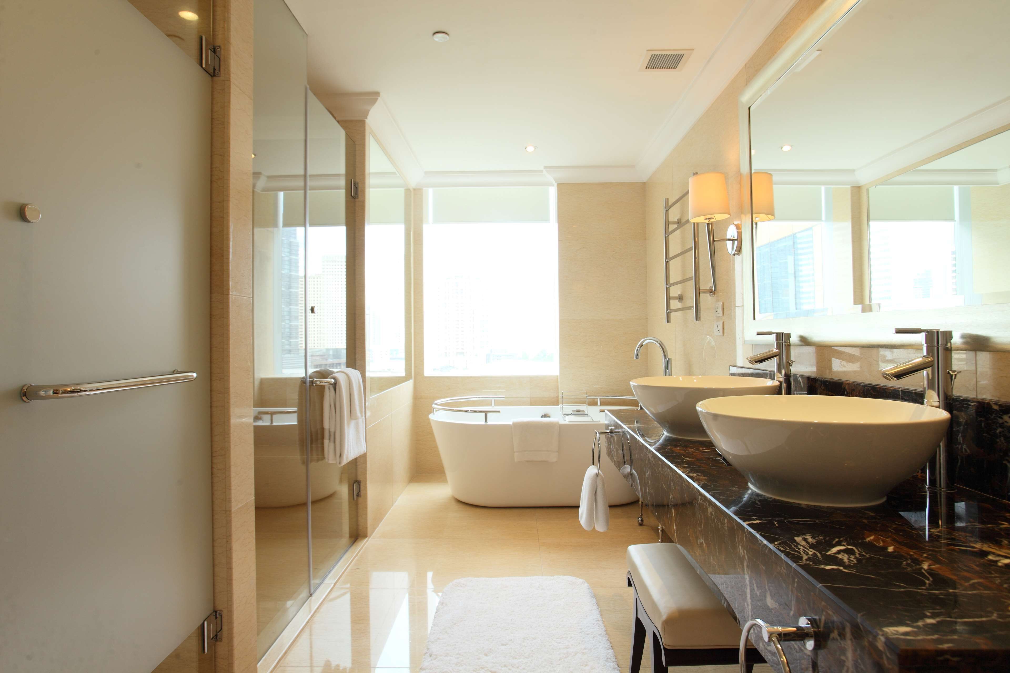 separate bathtub and shower, deep-soaking bathtub, rainfall showerhead