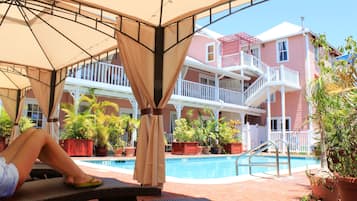 Outdoor pool, open 8:00 AM to 6:00 PM, pool umbrellas, pool loungers