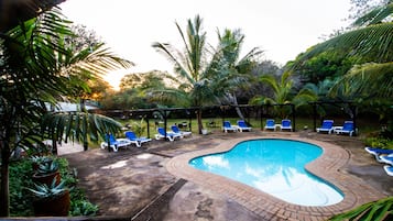 Outdoor pool, pool umbrellas, pool loungers