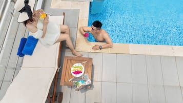 Outdoor pool, pool umbrellas, pool loungers