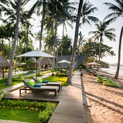 On the beach, sun loungers, beach umbrellas, beach towels