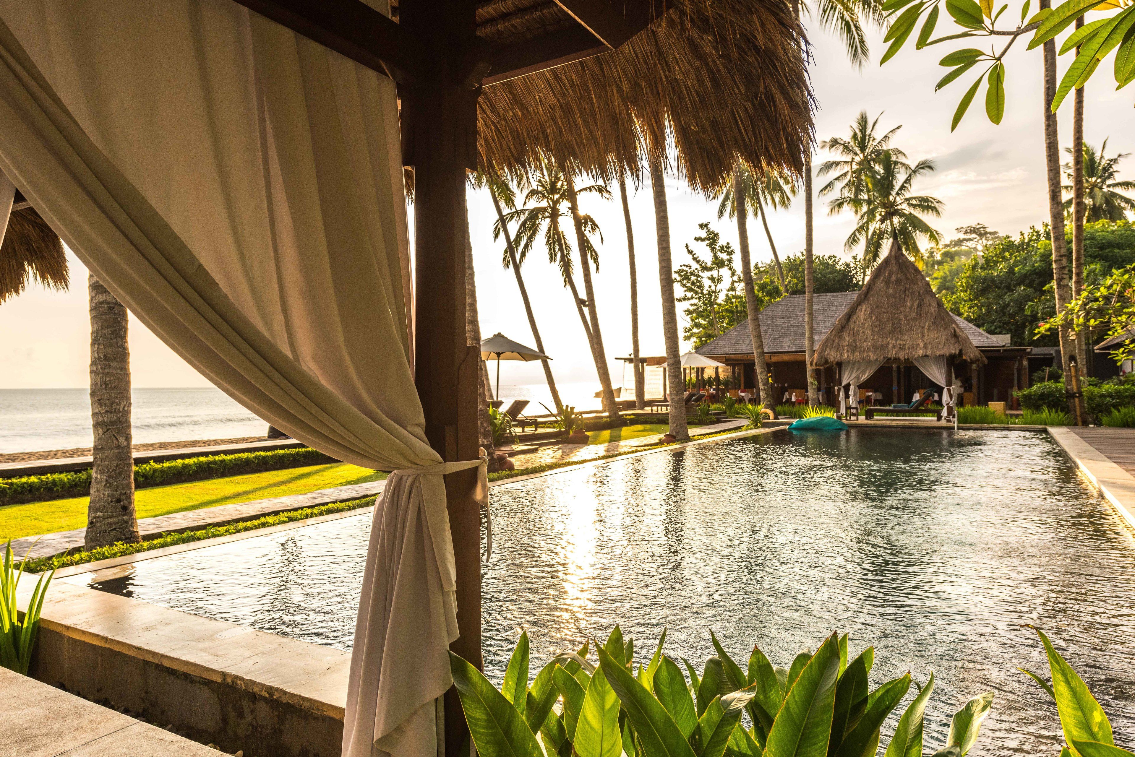 Outdoor pool, free pool cabanas, pool umbrellas