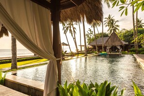 Outdoor pool, free pool cabanas, pool umbrellas