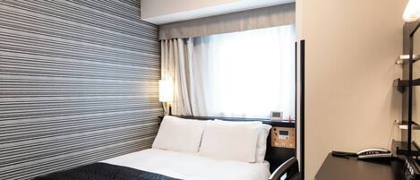 Down comforters, desk, blackout drapes, free WiFi