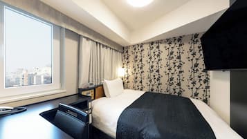 Habitación individual, para no fumadores (South Building, New Wing) | Edredón, escritorio, cortinas blackout y wifi gratis