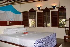 In-room safe, individually decorated, free cribs/infant beds, bed sheets - Unguja Lodge (Kizimkazi)