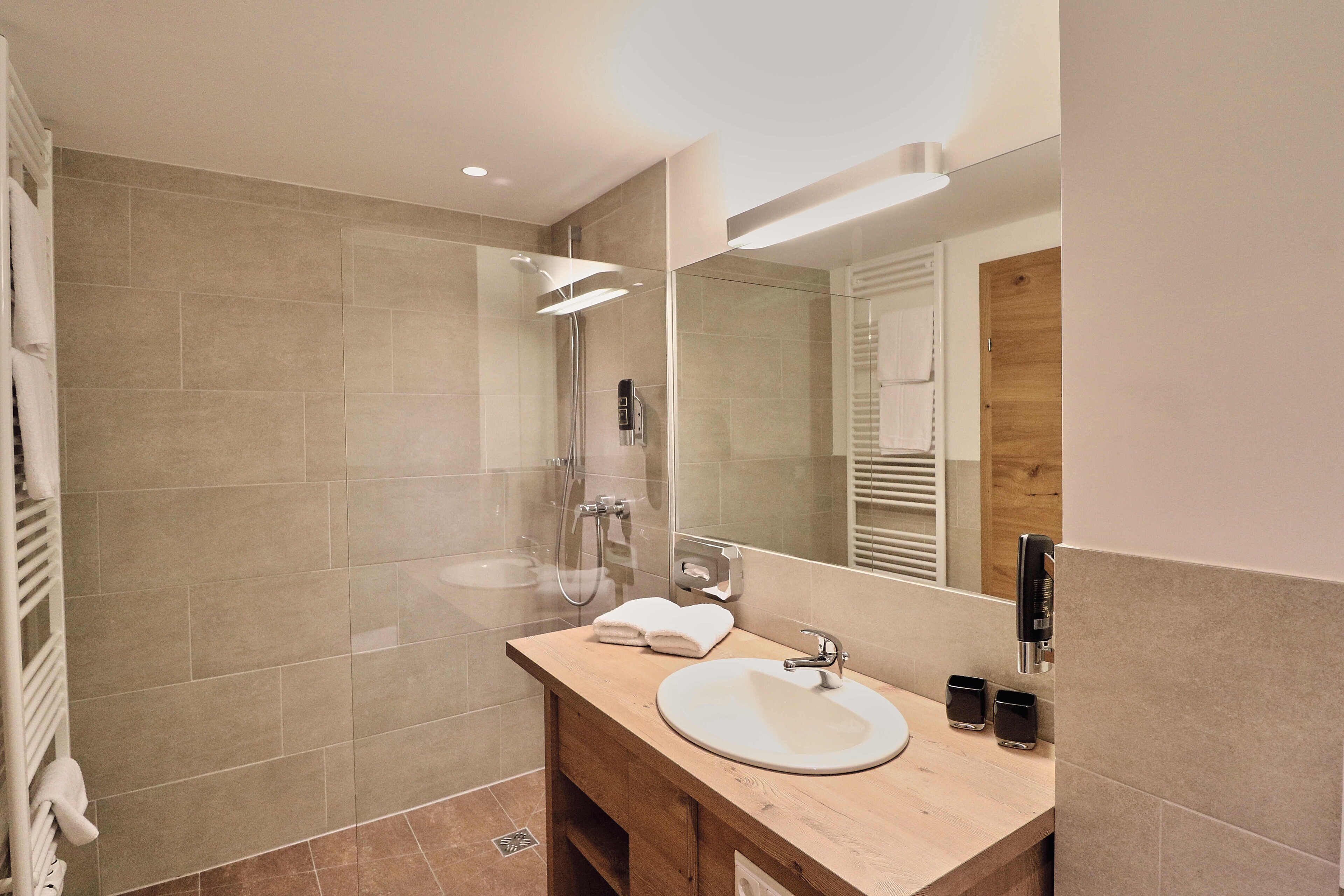 double room, annex building (kreuzjoch) | bathroom | hair dryer, towels