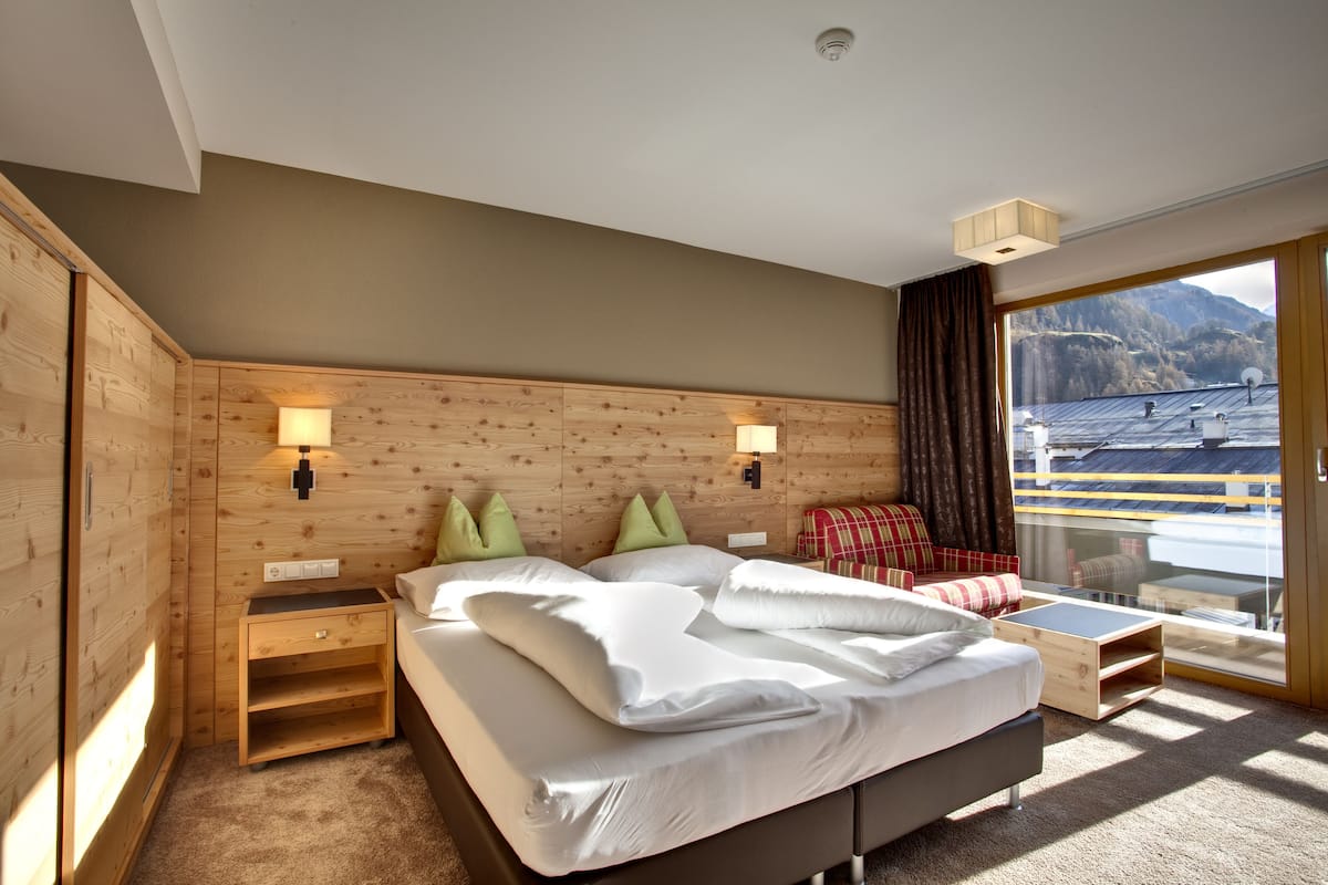 superior double room, balcony, mountain view | in-room safe, blackout curtains, free cots/infant beds, free wifi