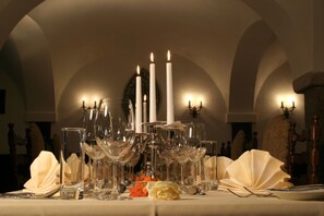 Formal dining experience with elegant table settings and classic ambiance.