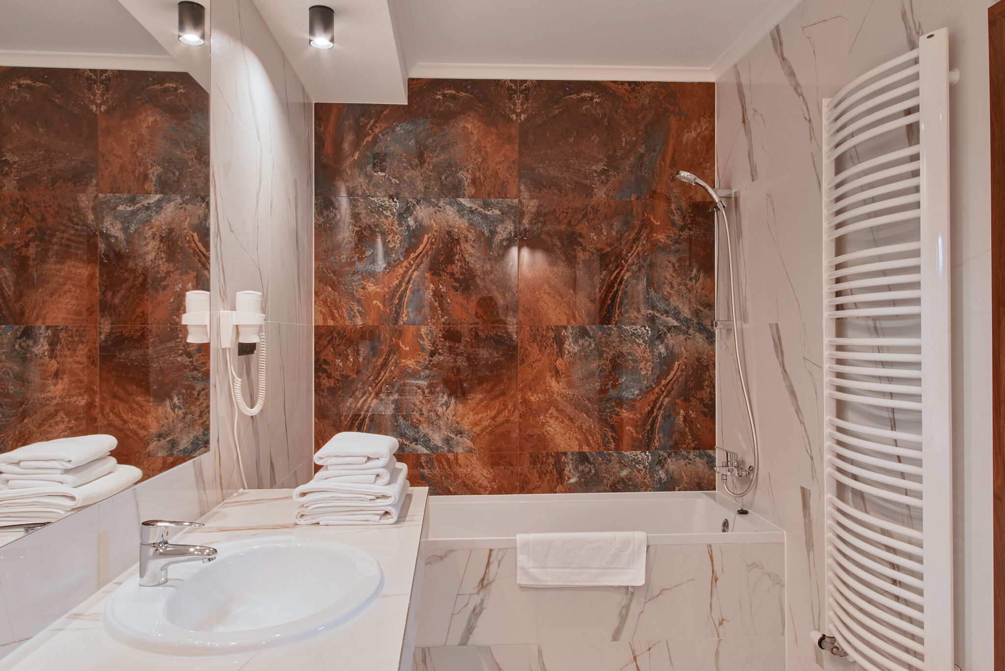 superior apartment | bathroom | rainfall showerhead, hair dryer, bathrobes, slippers