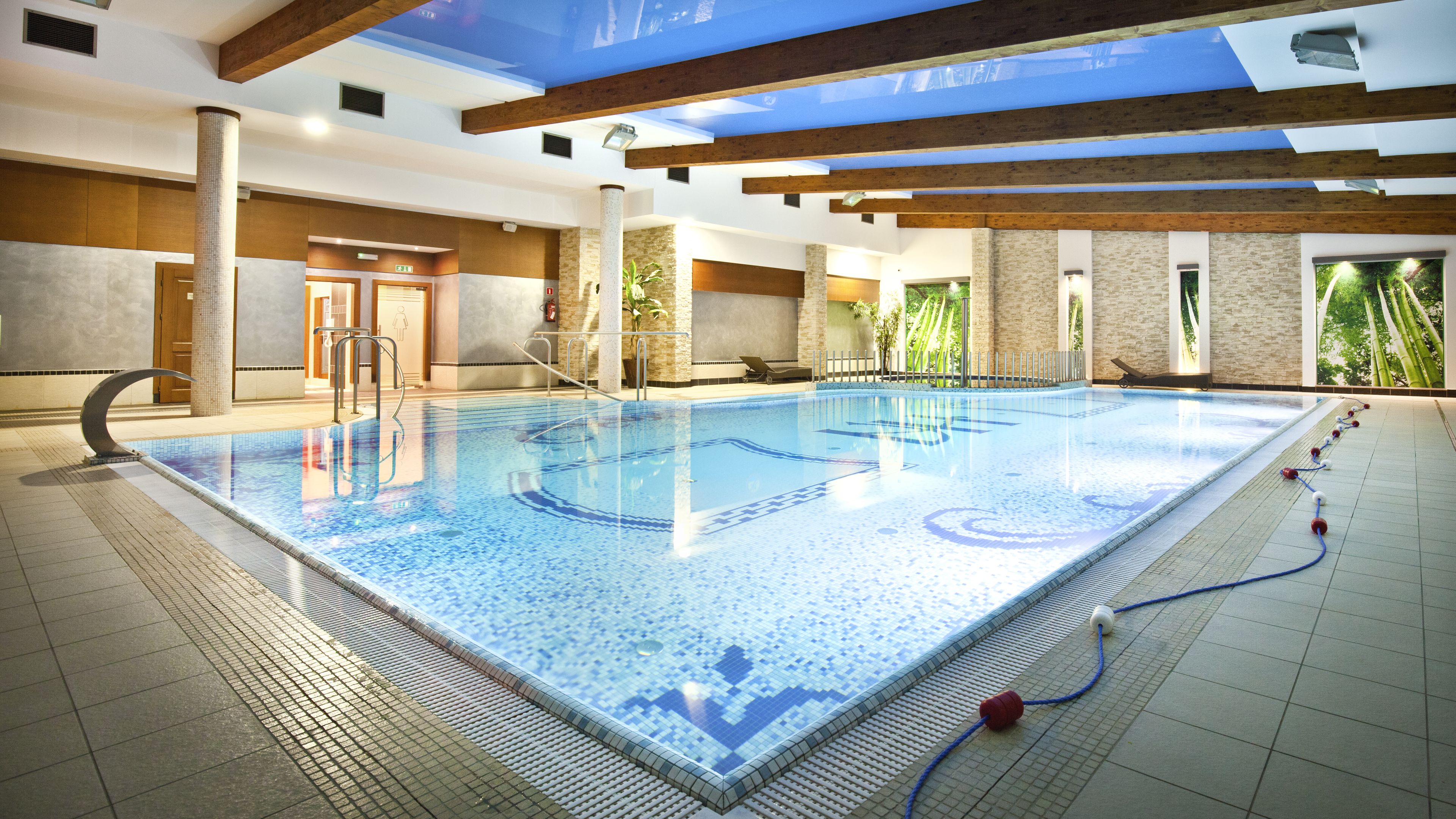 indoor pool, open 9:00 am to 9:00 pm, pool loungers