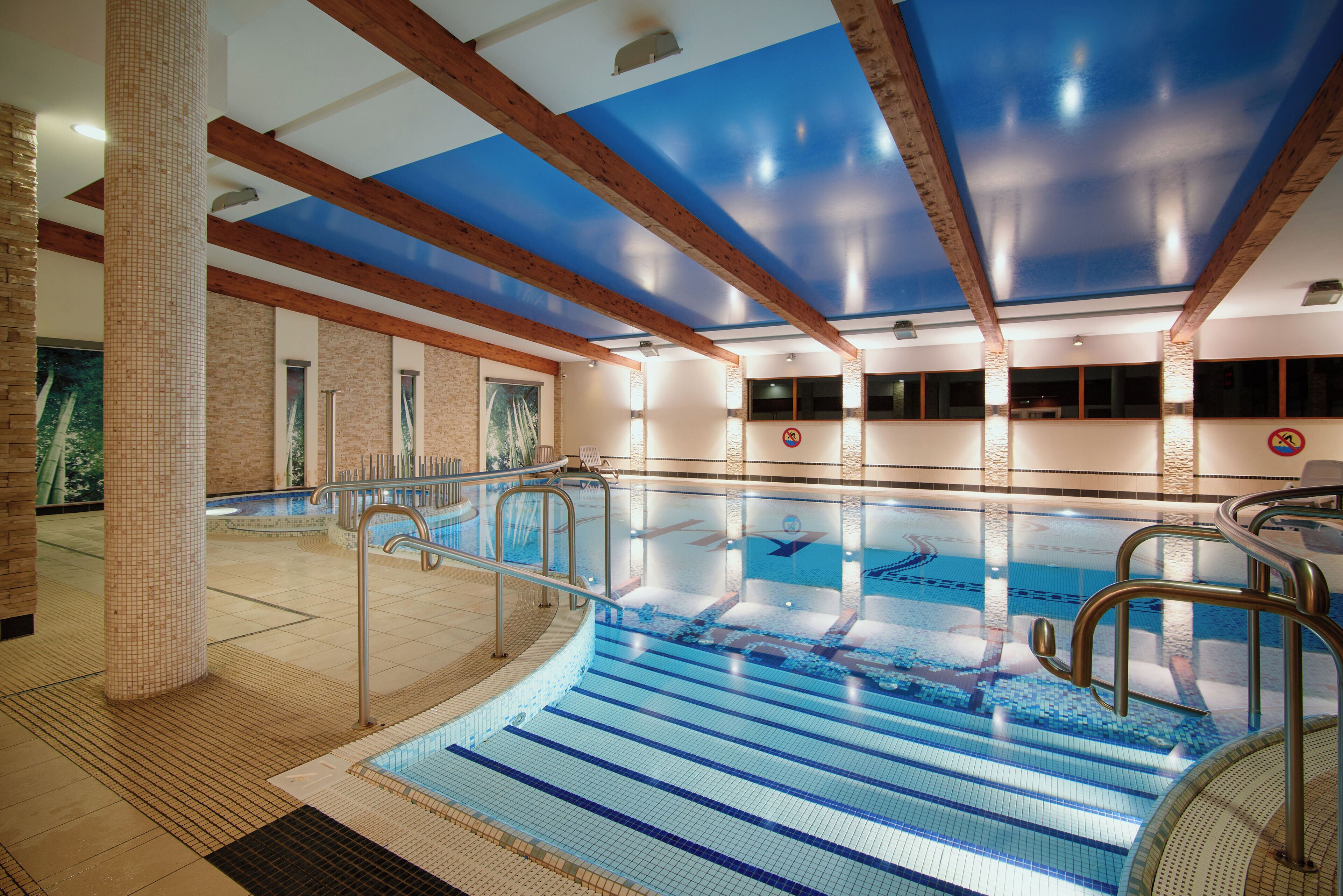indoor pool, open 9:00 am to 9:00 pm, pool loungers