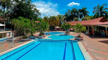 Outdoor pool, pool umbrellas, sun loungers