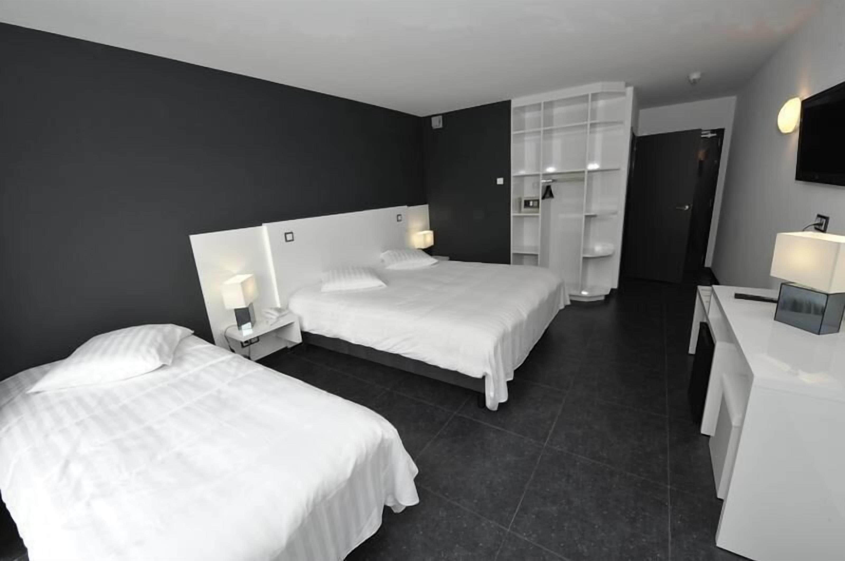 superior triple room, lake view | premium bedding, minibar, in-room safe, desk