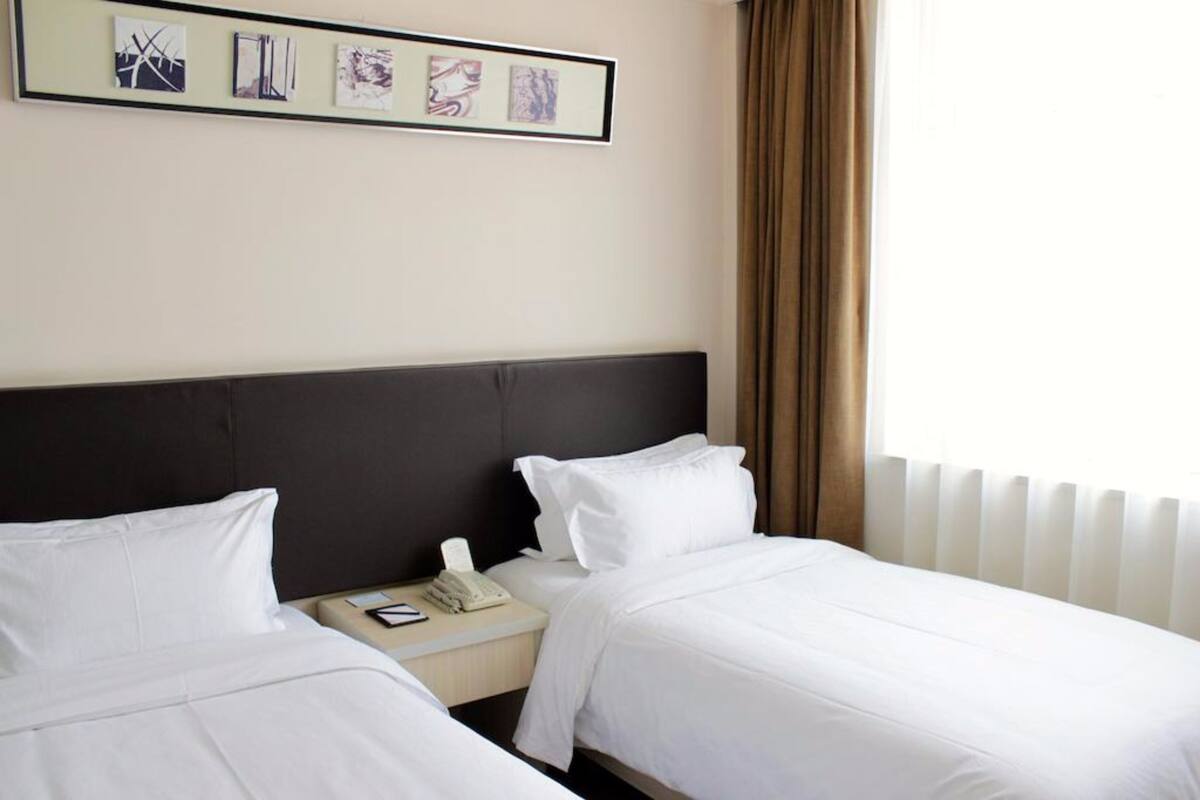 Desk, blackout drapes, iron/ironing board (on request), WiFi (free)