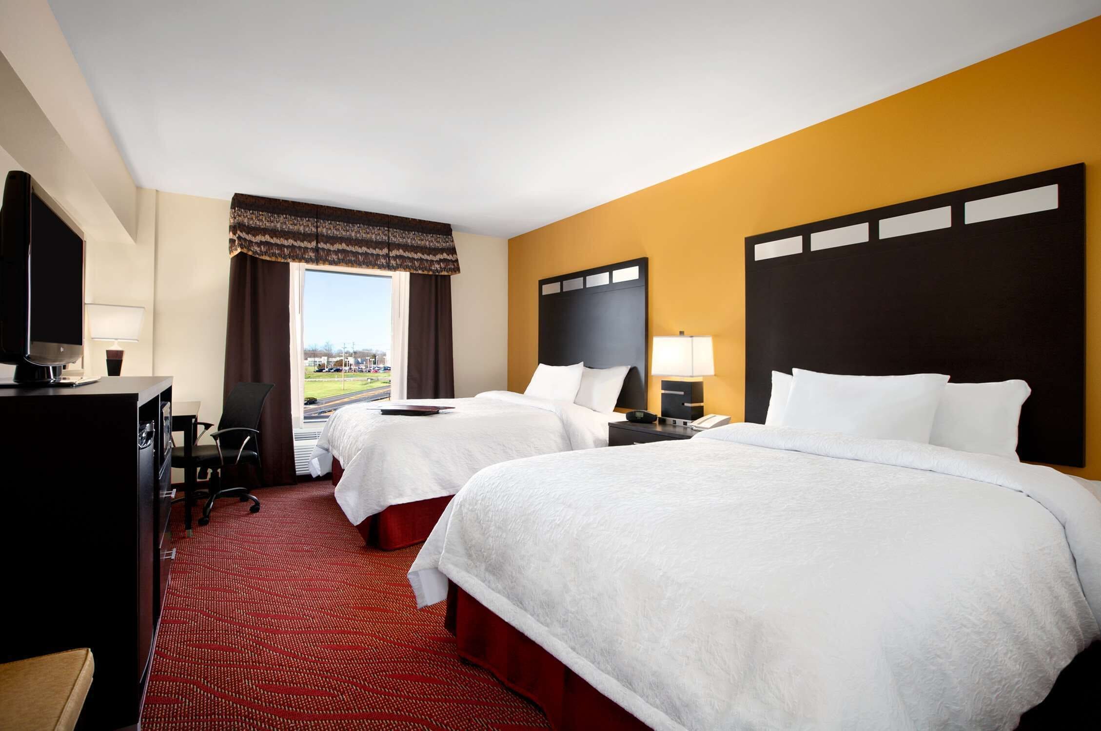 two queen beds | in-room safe, iron/ironing board, free rollaway beds, free wifi