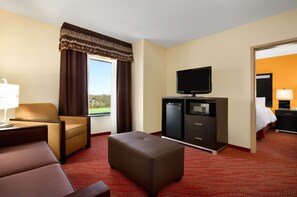 Studio, One King Bed | Living area | 32-inch plasma TV with cable channels, TV