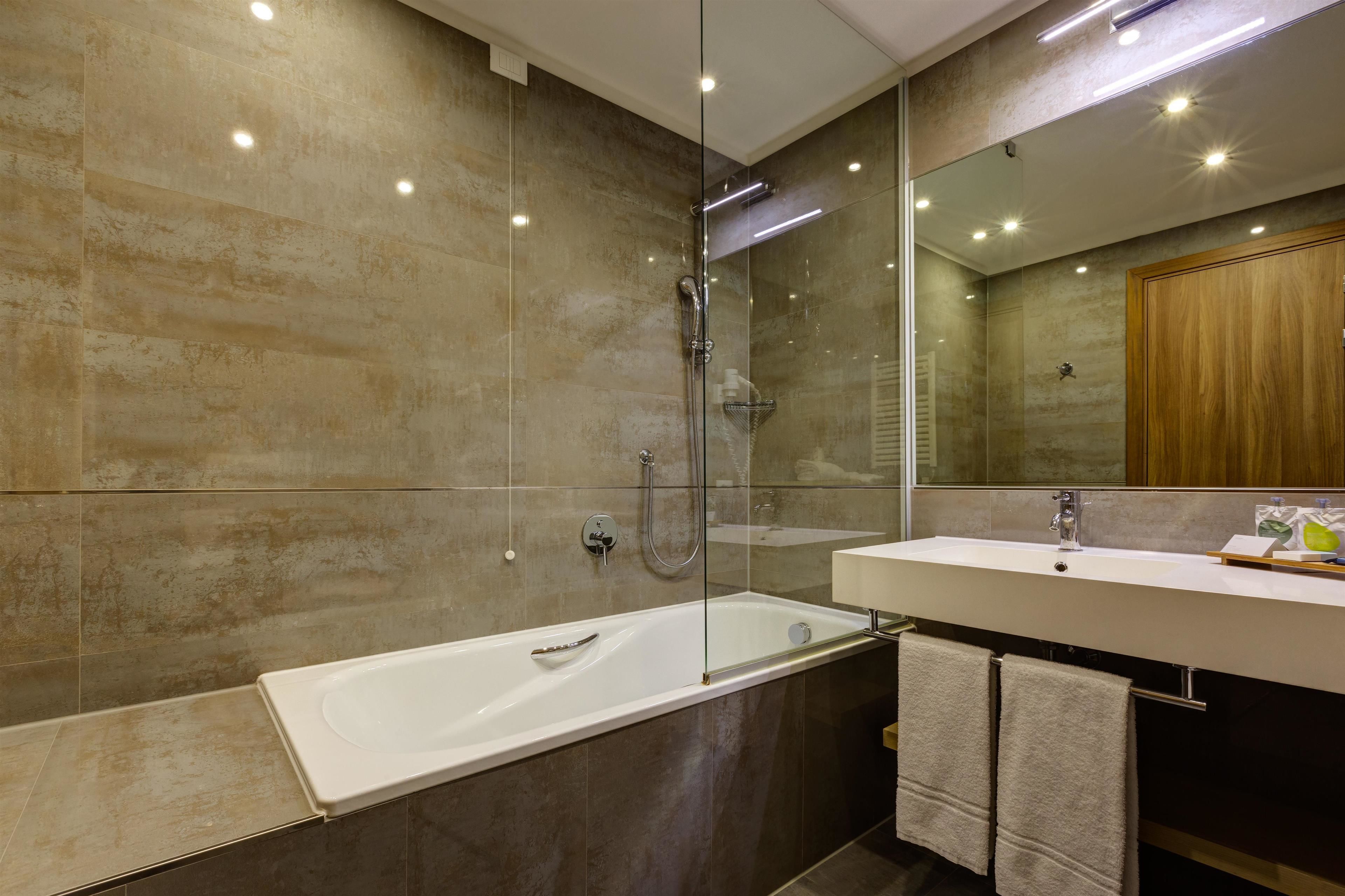 family room | bathroom | eco-friendly toiletries, hair dryer, bidet, towels