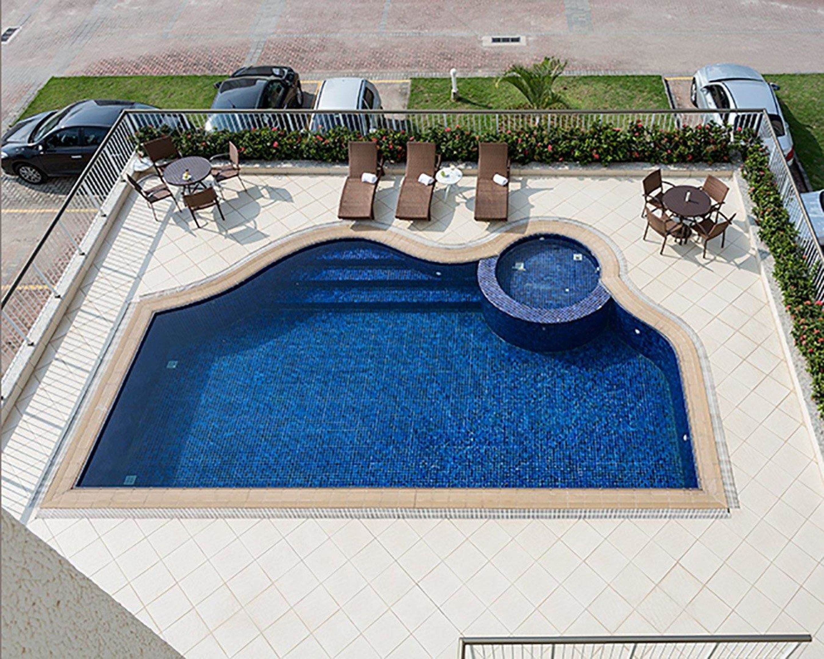 outdoor pool, pool umbrellas, pool loungers