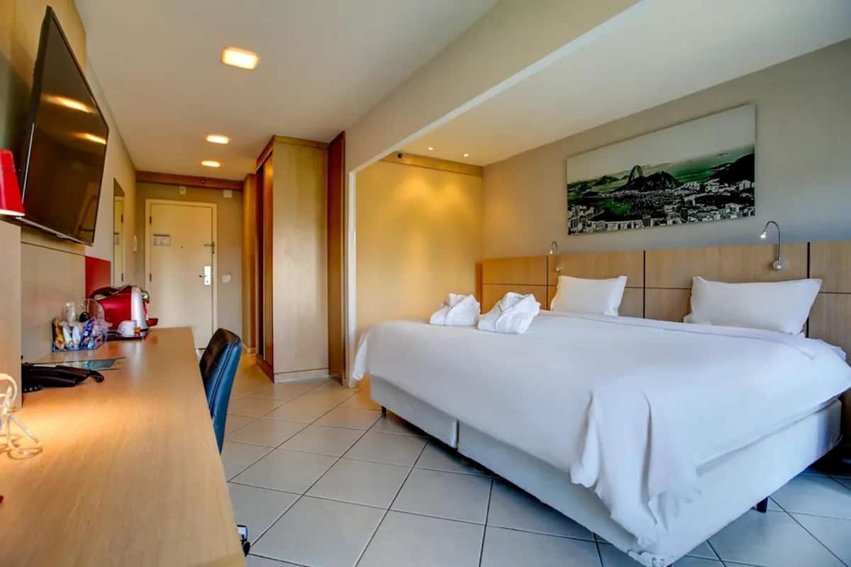 Hypo-allergenic bedding, minibar, in-room safe, desk