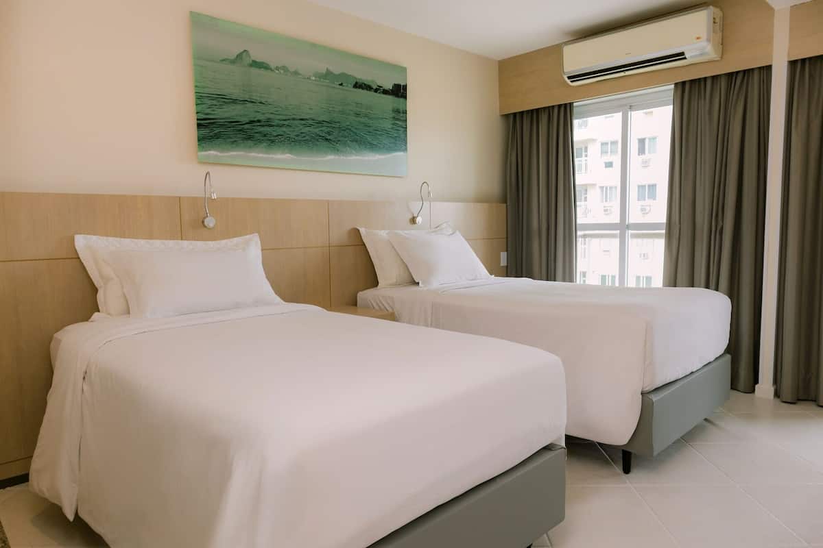 Hypo-allergenic bedding, minibar, in-room safe, desk