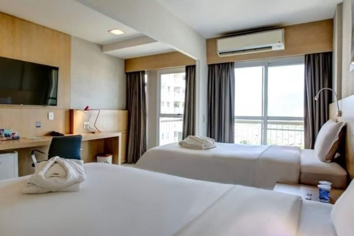 Hypo-allergenic bedding, minibar, in-room safe, desk