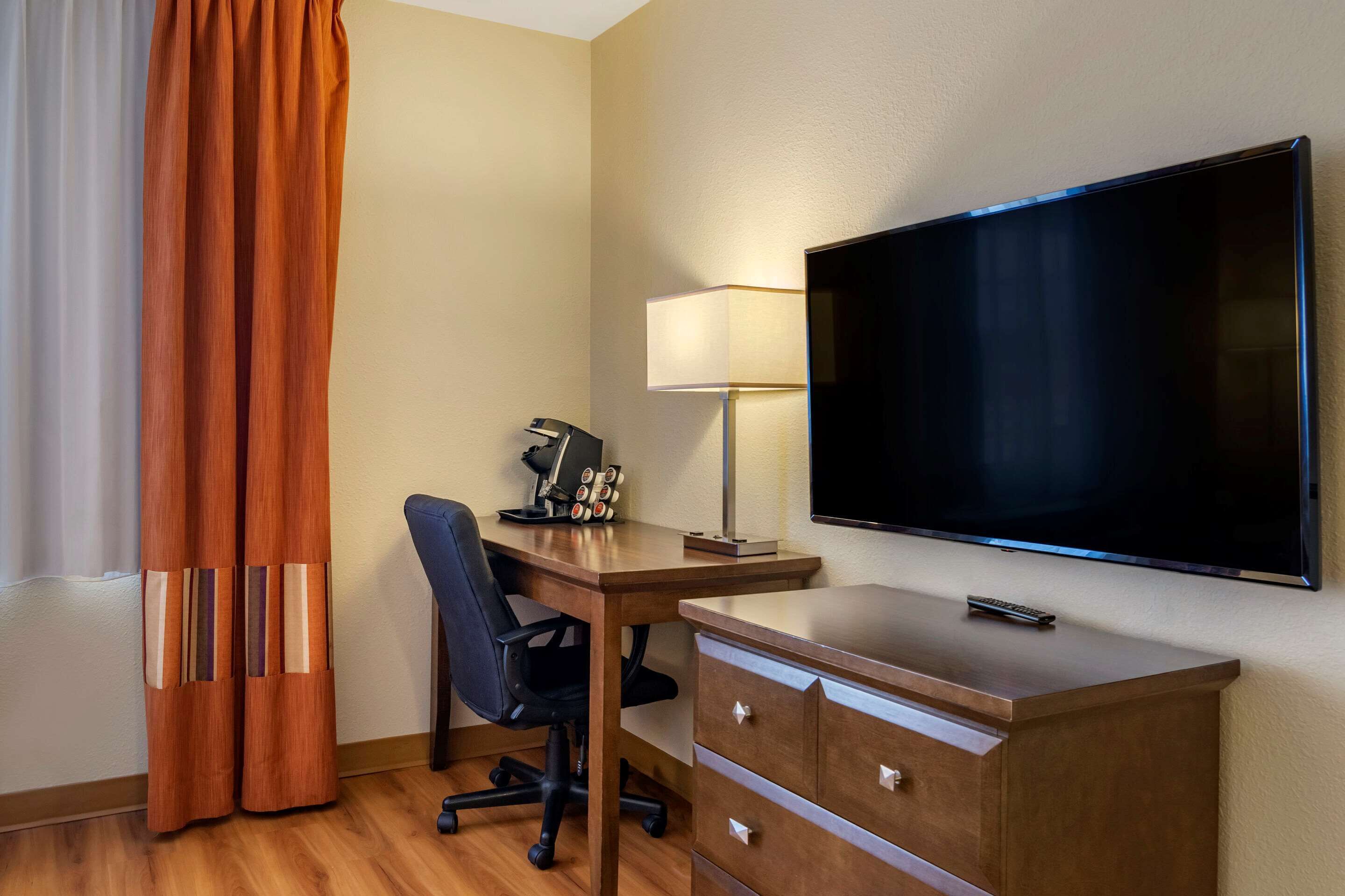 premium bedding, down duvets, desk, blackout curtains