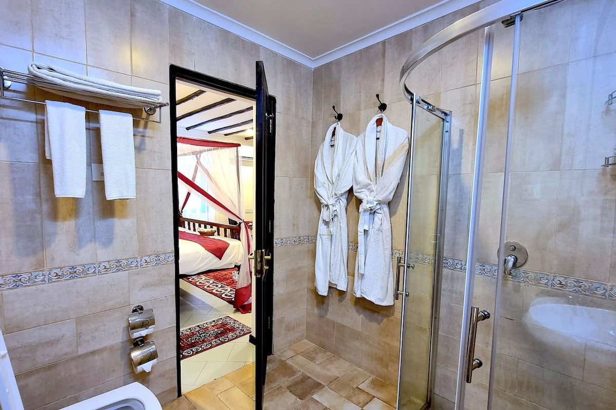 quadruple room, 2 bedrooms | bathroom | hair dryer, slippers, bidet, towels