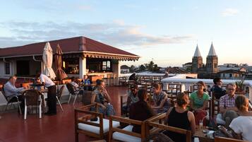 Rooftop bar, ocean views, open daily