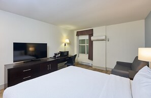 Habitación individual Deluxe | Ropa de cama de alta calidad y decoración individual