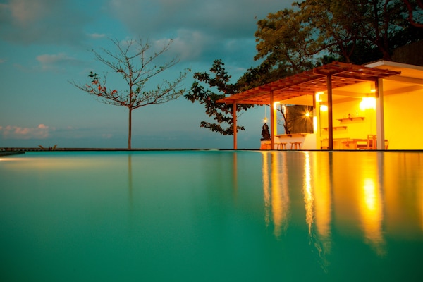 Outdoor pool, pool umbrellas, pool loungers