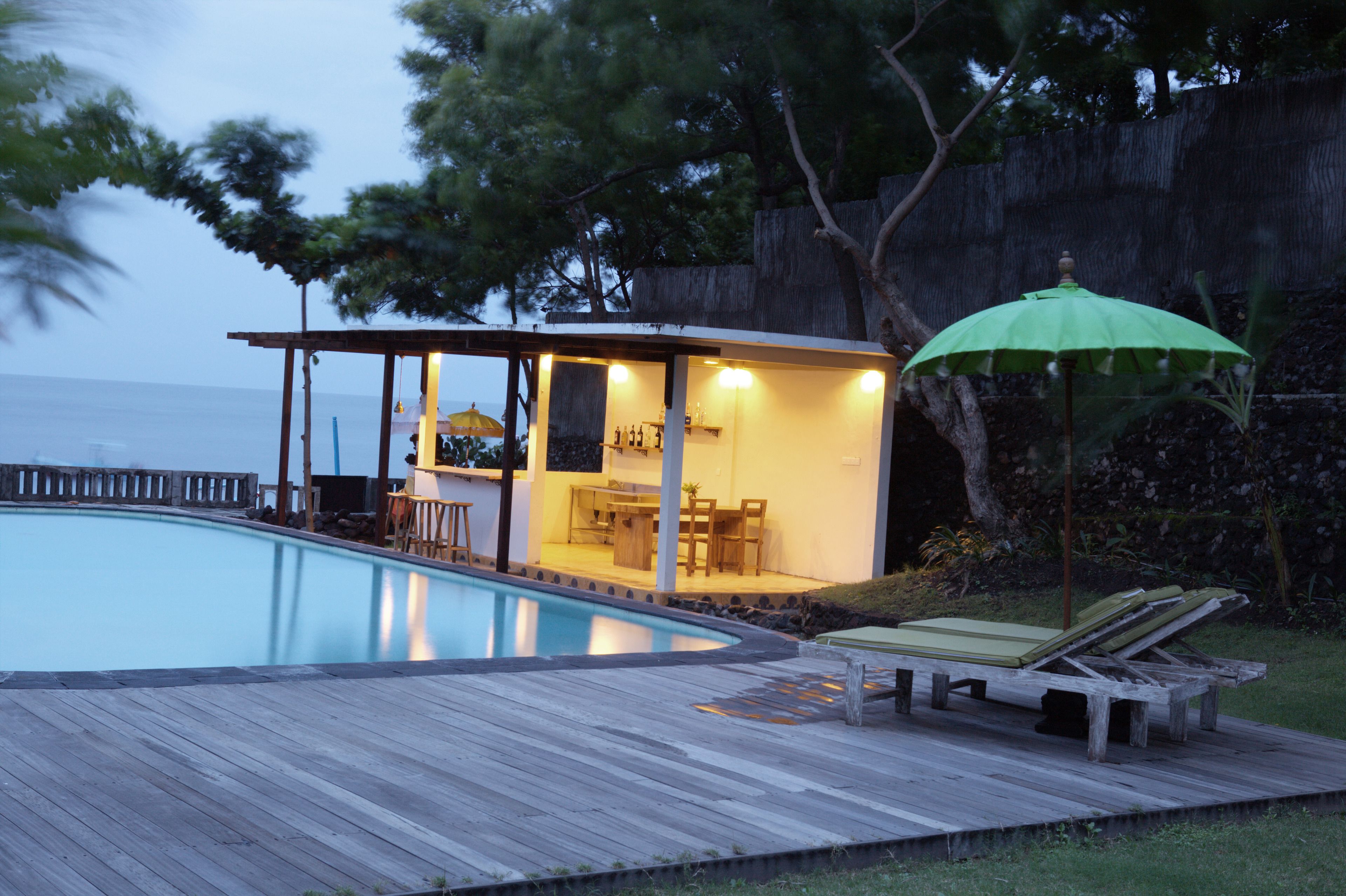 outdoor pool, pool umbrellas, pool loungers