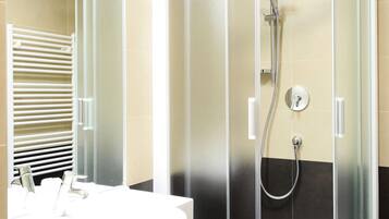Shower, free toiletries, hair dryer, towels
