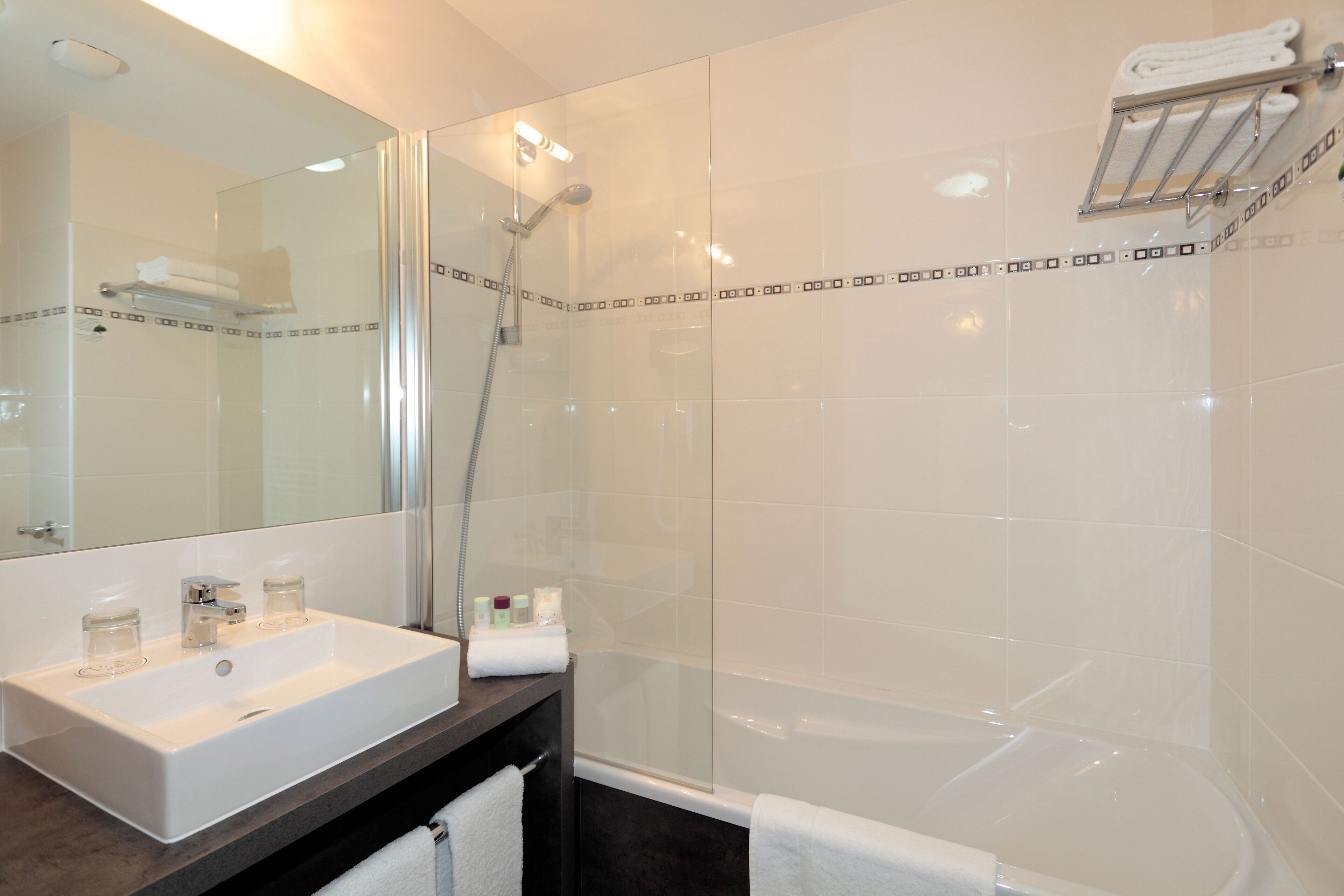 Bathtub, free toiletries, hair dryer, towels