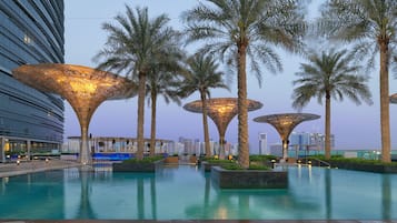 Outdoor pool, open 6:30 AM to 8:30 PM, pool umbrellas, pool loungers