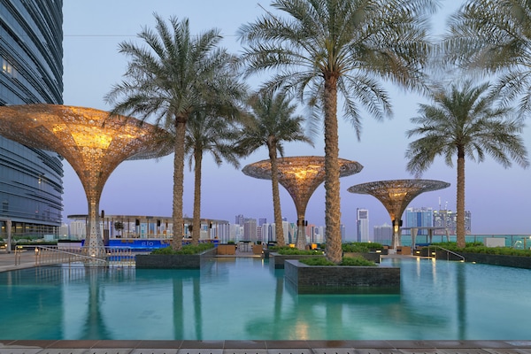 Outdoor pool, open 6:30 AM to 10:00 PM, pool umbrellas, sun loungers