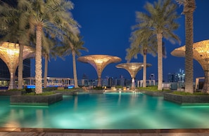 Outdoor pool, open 6:30 AM to 10:00 PM, pool umbrellas, pool loungers